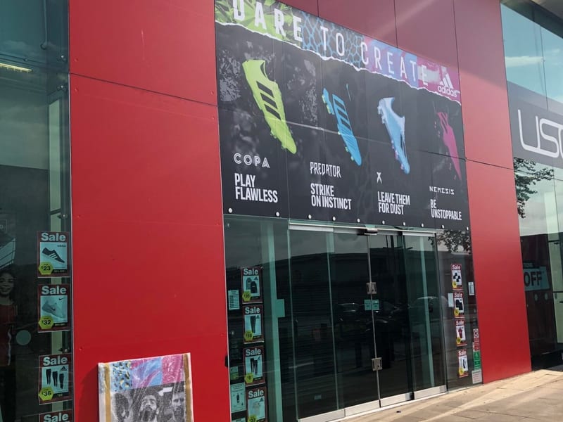 Large-format printed shopfront banner