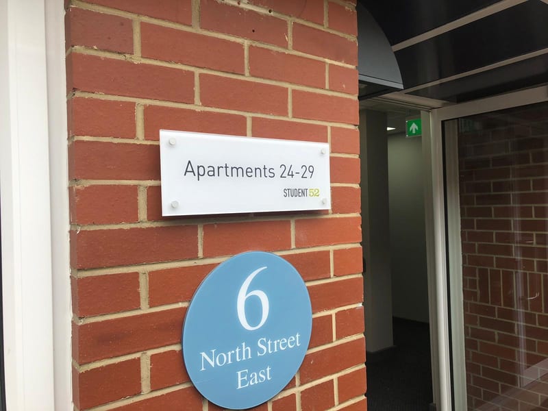 Wayfinding and tactile signage plaques